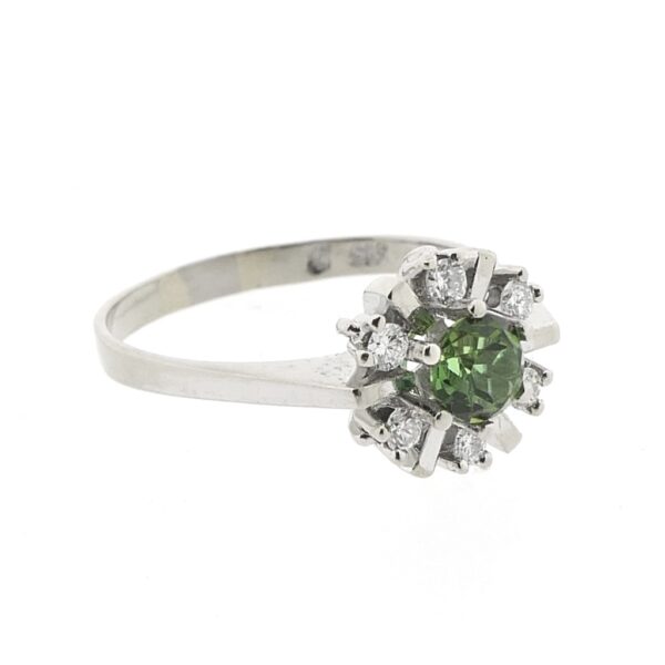 Witgouden ring met peridoot en diamanten | 0,24 ct.