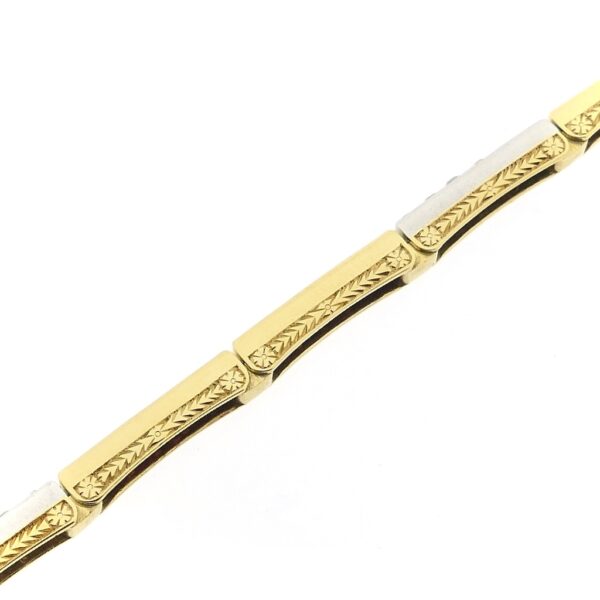 18 Krt. Gouden staafjes schakel armband met robijn en diamant; 0,72 ct. | 17,5 cm