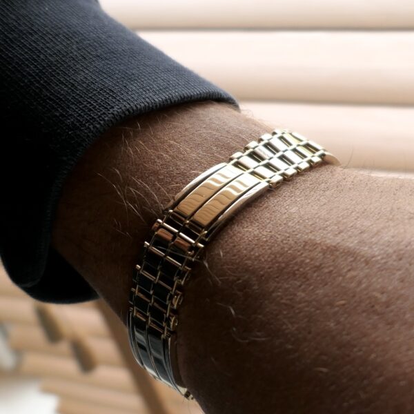 Bicolor gouden fantasie schakel armband | 21,5 cm