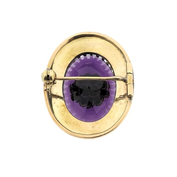 Gouden broche met amethist en zirconia