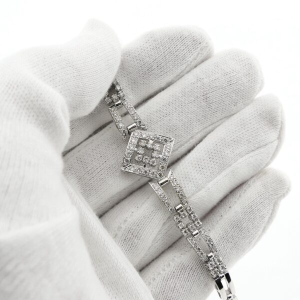 18 Krt. Witgouden schakel armband met diamant; 1,40 ct. | 18 cm