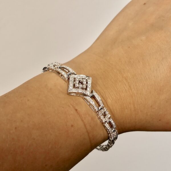 18 Krt. Witgouden schakel armband met diamant; 1,40 ct. | 18 cm