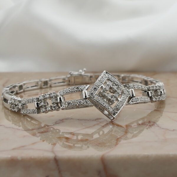 18 Krt. Witgouden schakel armband met diamant; 1,40 ct. | 18 cm