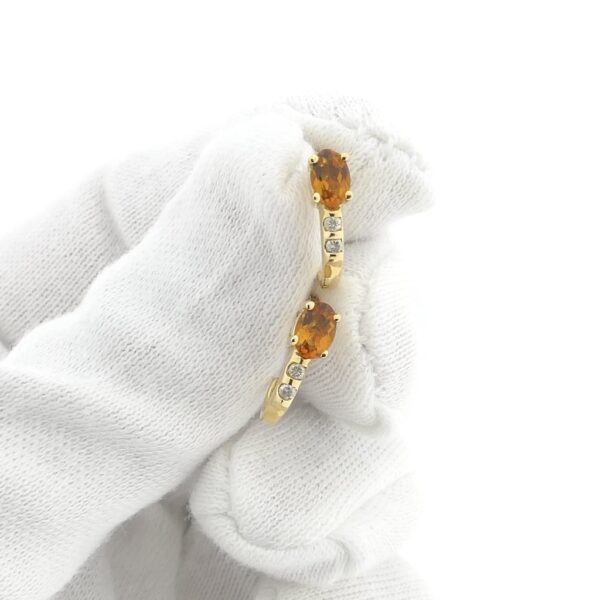 Gouden oorstekers met citrien en diamant | 0,08 ct.